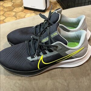 Nike Black and Gray Sneakers with green Swoosh